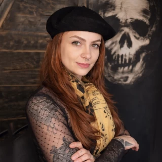 Stella - The Black Hat Tattoo