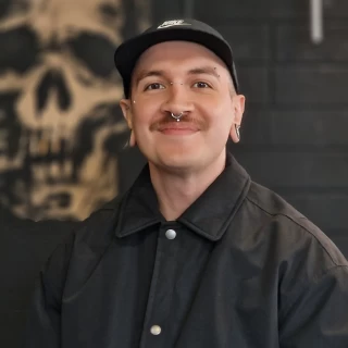 AJ - The Black Hat Tattoo