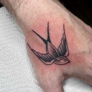 Swallow - Hands & Fingers Tattoo - Black Hat Tattoo Dublin - The Black Hat Tattoo