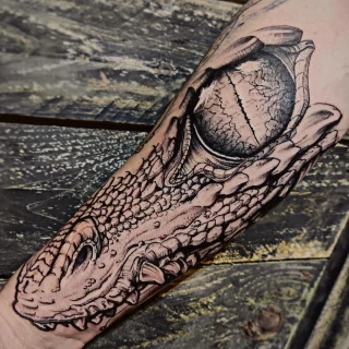 Alligator or Crocodile Tattoo on arm - Black Hat Tattoo Dublin - The Black Hat Tattoo