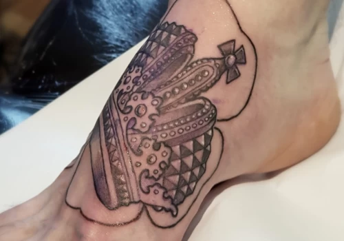 Featured image - Foot tattoos_ one of the most painful spots - The Black Hat Tattoo