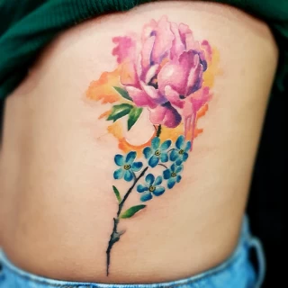 Flower on side tattoo - Color Watercolor and Sketch Tattoos - Black Hat Tattoo Dublin - The Black Hat Tattoo