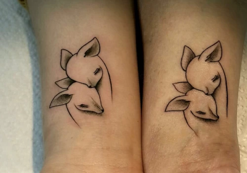 Featured image - Couple Tattoos_ 20 Unique Ideas to Seal Your Love (That Aren’t Names) - The Black Hat Tattoo