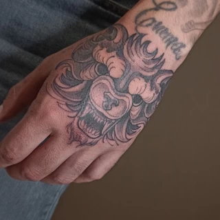 Wolf - Hands & Fingers Tattoo - Black Hat Tattoo Dublin - The Black Hat Tattoo