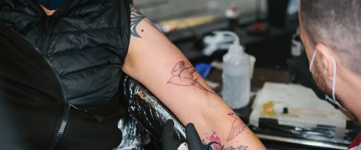 What type of water do tattoo artists use during the tattoo session ?
