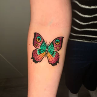 green and red butterfly tattoo  - Black Hat Tattoo Dublin - The Black Hat Tattoo