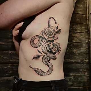 Large snake tattoo on side - Snake Tattoo - Black Hat Tattoo Dublin - The Black Hat Tattoo