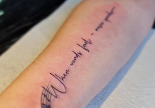 Featured image - Decoding XOXO Tattoos_ A Modern Twist on Classic Romance - The Black Hat Tattoo
