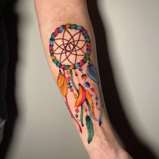 Dreamcatcher on arm tatoo - Color Watercolor and Sketch Tattoos - Black Hat Tattoo Dublin - The Black Hat Tattoo