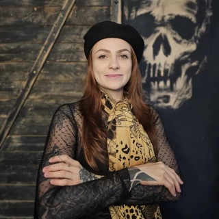 Stella - The Black Hat Tattoo