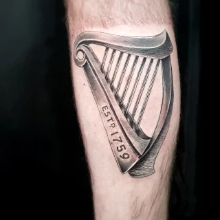 Celtic Harp Tattoo - Black & Grey Tattoo - Black Hat Tattoo Dublin - The Black Hat Tattoo