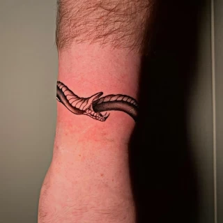 Snake bracelet tattoo - Snake Tattoo - Black Hat Tattoo Dublin - The Black Hat Tattoo