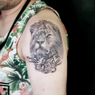 lion on shoulder - Realism, Microrealism and Portrait Tattoo - Black Hat Tattoo Dublin - The Black Hat Tattoo