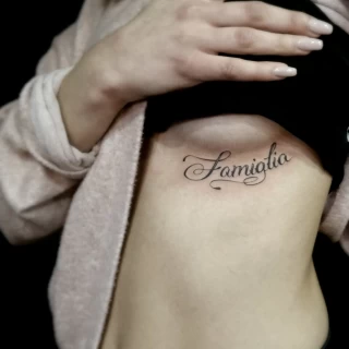 familia - Script Quote Tattoo - Black Hat Tattoo Dublin - The Black Hat Tattoo