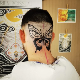 Head Butterfly Tattoo on neck -  - Black Hat Tattoo Dublin - The Black Hat Tattoo