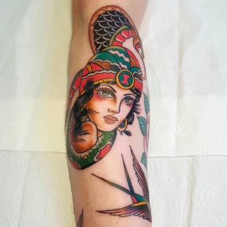Women and snake tattoo - OldSchool Tattoo - Black Hat Tattoo Dublin - The Black Hat Tattoo