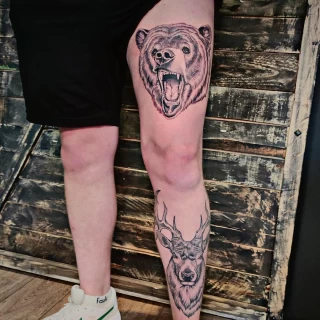 Bear and Stag tattoos on leg - Black Hat Tattoo Dublin - The Black Hat Tattoo