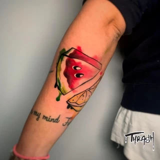 Watermelon Tattoo color on arm - Color Watercolor and Sketch Tattoos - Black Hat Tattoo Dublin - The Black Hat Tattoo