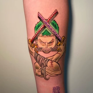 One piece caracter tattoo on arm - Color Watercolor and Sketch Tattoos - Black Hat Tattoo Dublin - The Black Hat Tattoo