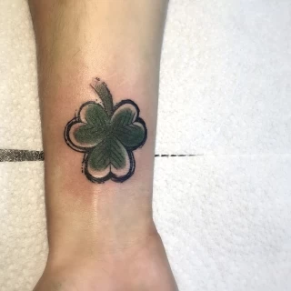 Green shamerock on wrist - Irish & Celtic Tattoo - Black Hat Tattoo Dublin - The Black Hat Tattoo