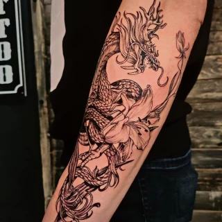 Dragon Tattoo on Arm Full sleeve - Black Hat Tattoo Dublin - The Black Hat Tattoo
