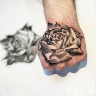 Realistic rose on hand - Rose Tattoo - Black Hat Tattoo Dublin - The Black Hat Tattoo