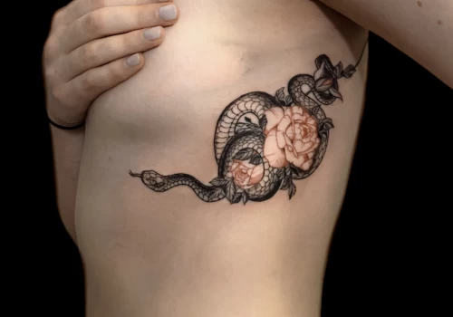 Featured image - Rib tattoos_ why do they hurt so much - The Black Hat Tattoo