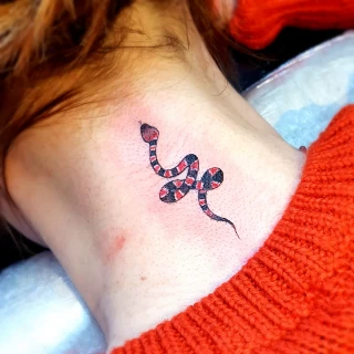 Small snake on neck - Snake Tattoo - Black Hat Tattoo Dublin - The Black Hat Tattoo