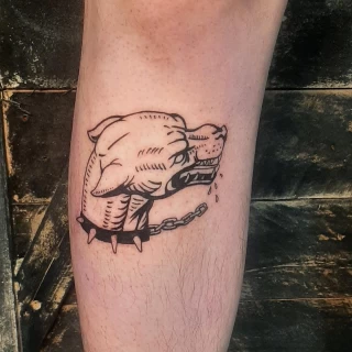 Raging Dog on leg Tattoo - Black Hat Tattoo Dublin - The Black Hat Tattoo