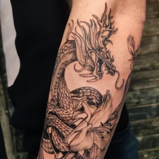 - Dragon Tattoo  - Black Hat Tattoo Dublin - fine lines arm - The Black Hat Tattoo