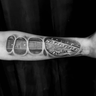 Guitar - Realism, Microrealism and Portrait Tattoo - Black Hat Tattoo Dublin - The Black Hat Tattoo