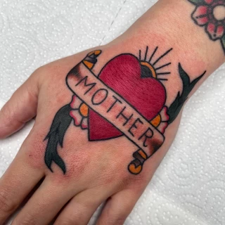 Heart on hand - OldSchool Tattoo - Black Hat Tattoo Dublin - The Black Hat Tattoo