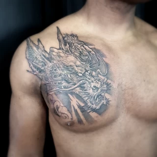 Dragon on chest - Tattoo Neotraditionnal - Black Hat Tattoo Dublin - The Black Hat Tattoo