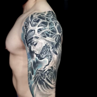 Biomechanical Tattoo on Upper Arm - Woman Face - Dublin - Black Hat - Color - Black Hat Tattoo Dublin - The Black Hat Tattoo