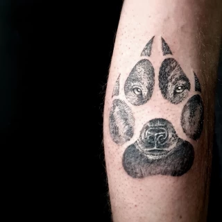 Wolf in pawn - Wolf Tattoo - Black Hat Tattoo Dublin - The Black Hat Tattoo