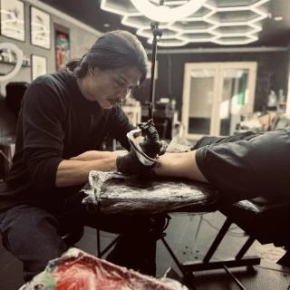 João - The Black Hat Tattoo