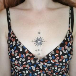 Mandala between boobs - Tattoo for girls - Black Hat Tattoo Dublin - The Black Hat Tattoo