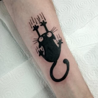 Scratching Cat Tattoo on arm - Cat Tattoo - Black Hat Tattoo Dublin - The Black Hat Tattoo