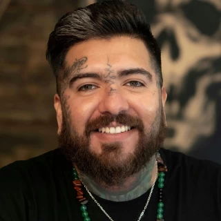 Joel - The Black Hat Tattoo