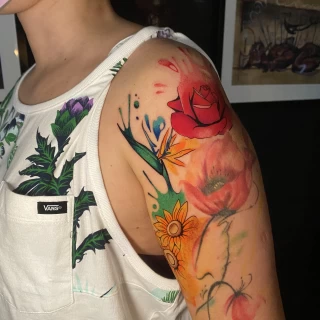 Rose red flower tattoo on shoulder - Color Watercolor and Sketch Tattoos - Black Hat Tattoo Dublin - The Black Hat Tattoo