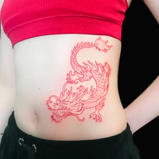 - Dragon Tattoo  - Black Hat Tattoo Dublin - red - The Black Hat Tattoo