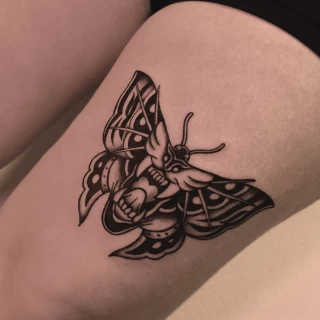 Stella - resident artist - butterfly tattoo - old school - black and grey - the black hat tattoo Dublin- 2025 - The Black Hat Tattoo