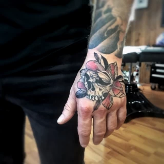 Neotrad skull on hand - Hands & Fingers Tattoo - Black Hat Tattoo Dublin - The Black Hat Tattoo