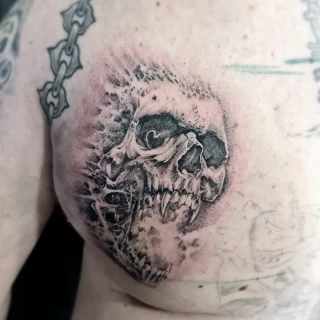 Skull Tattoo on chest -  - Blackwork Darkwork - Black Hat Tattoo Dublin - The Black Hat Tattoo