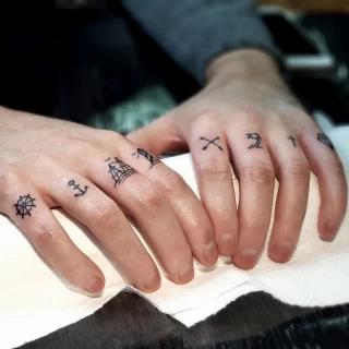 Petits symbols - Hands & Fingers Tattoo - Black Hat Tattoo Dublin - The Black Hat Tattoo