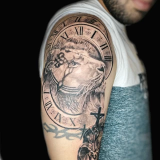 Clock and lion on shoulder - Lion Tattoo - Black Hat Tattoo Dublin - The Black Hat Tattoo