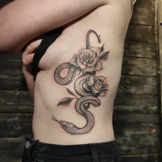 Snake and flowers - Tattoo for girls - Black Hat Tattoo Dublin - The Black Hat Tattoo