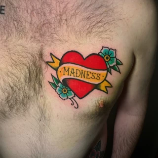 Heart Tattoo on chest - OldSchool Tattoo - Black Hat Tattoo Dublin - The Black Hat Tattoo