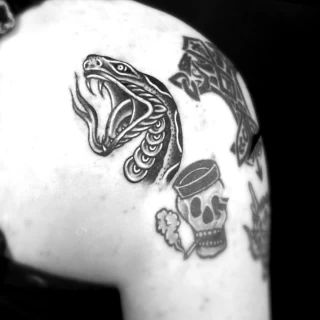 snake head old school on shoulder - Snake Tattoo - Black Hat Tattoo Dublin - The Black Hat Tattoo