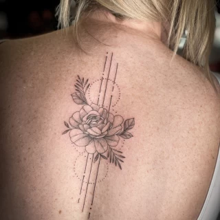 Fine lines composition on back flowers - Tattoo for girls - Black Hat Tattoo Dublin - The Black Hat Tattoo